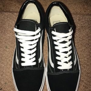 black fairly worn “old skool” vans